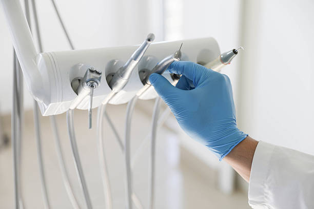 Professional Tooth Extraction technician working in University Heights, IA